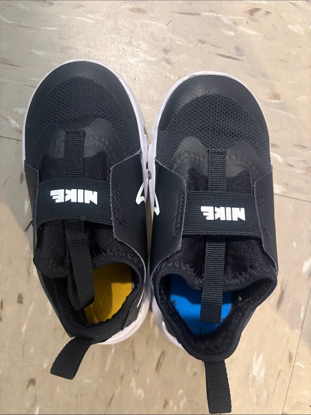 Nike Kids Black Slip-On Sneakers with Blue & Yellow Insoles